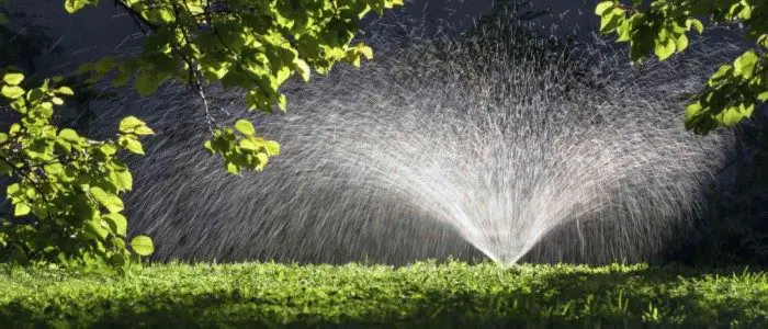 when to stop watering the lawn in fall